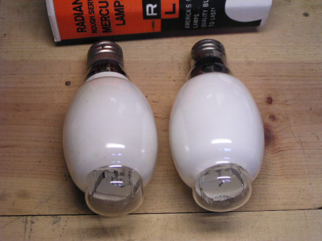 Radiant mercury vapor lamps
An old picture and the 250w one has since been traded away. The 175w one I still have casts a pleasant greenish glow when lit. Made in '65 and it has a /C phosphor.
Keywords: Lamps