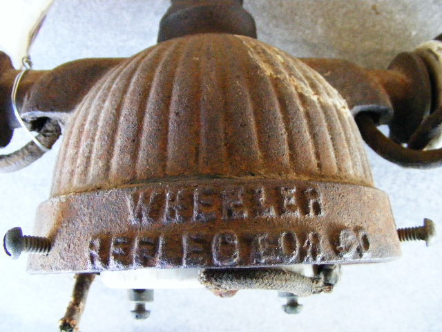 The wheeler fixture part
These pictures are of the older wheeler light fixture I found in a junk store. I wish to find the lower half. I believe this one lowered up a and down on a chain. Anybody have a photo of a complete light fixture?
Keywords: Miscellaneous